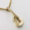 Pendentif Guitare En Or -Vivalatina Boutiqe pendentif petite guitare or 1